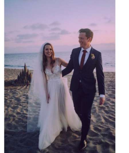 Griffin Cleverly and his wife, Bridgit Mendler, at their wedding ceremony.